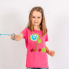 Mädchen T-Shirt in Pink mit aufgenähtem Garten Bild | sticklett Online Store.